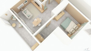 A modern apartment layout with a living area, kitchen, bathroom, and a small balcony. - Roches Marines (Saint-Paul)