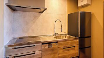 Fridge, microwave, cookware/dishes/utensils