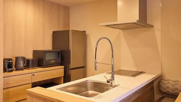 Fridge, microwave, cookware/dishes/utensils