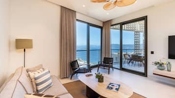 Habitación cuádruple de lujo, vistas al mar | Zona de estar