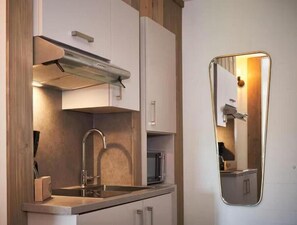 Apartamento clásico, balcón, vistas al jardín | Cocina privada