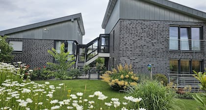 Apartment 'Am Naturpark Terra Vita' with Private Garden, Wi-Fi, and Air Conditioning