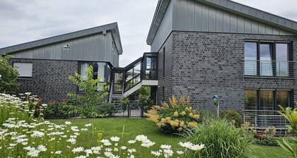 Apartment 'Am Naturpark Terra Vita' with Private Garden, Wi-Fi, and Air Conditioning