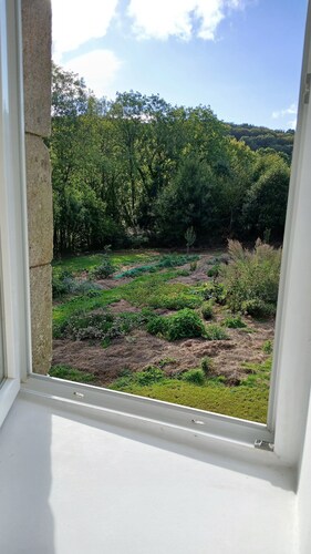 Chambre d’hôtes « Chambre Calendula Pleine Nature » avec jardin partagé et Wi-Fi