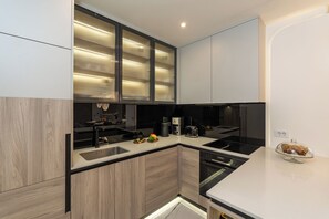 Departamento, balcón, vista al jardín | Cocina privada