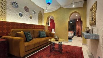 Chambre Triple Exclusive | Coin séjour