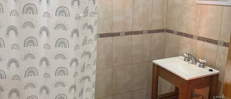 Shower, towels, soap, toilet paper
