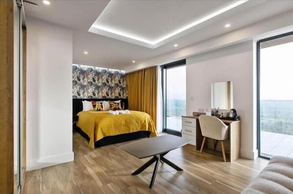 Deluxe Double Room, Balcony, City View | In-room safe, iron/ironing board, free WiFi