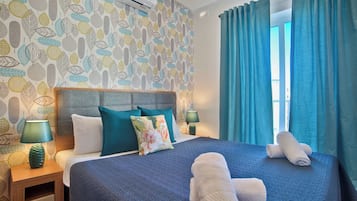2 bedrooms, laptop workspace, iron/ironing board, bed sheets