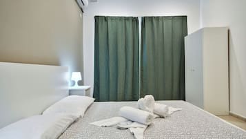 3 bedrooms, iron/ironing board, cribs (free), bed sheets