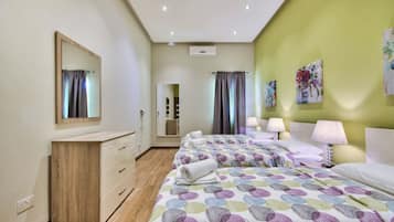 4 bedrooms, laptop workspace, iron/ironing board, free cots/infant beds