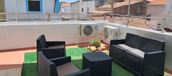 Vacation Home in the Heart of the Village with Private Terrace, Wi-Fi, and Air Conditioning