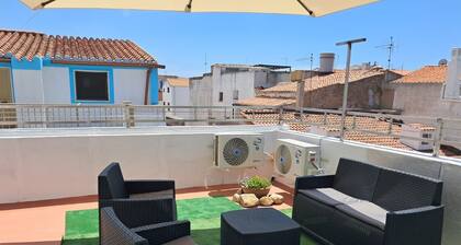 Vacation Home in the Heart of the Village with Private Terrace, Wi-Fi, and Air Conditioning