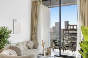 Living area - Luxurious JVC Getaway l Infinity Pool & Gym (Dubai)