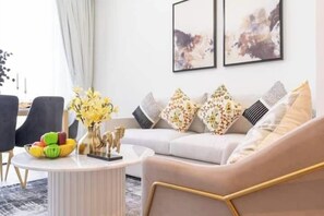 Luxury Apartment, City View | Living area - Vogue | Sobha Hartland close to Downtown Dubai Mall | Burj Khalifa (Dubai)