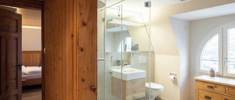 Shower, towels, soap, shampoo