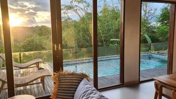 Deluxe Villa, Pool View | Living area | LED TV, Netflix, streaming services
