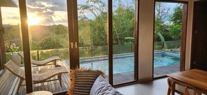 Deluxe Villa, Pool View | Living area | LED TV, Netflix, streaming services - The Falken Bali Villa (Tabanan)