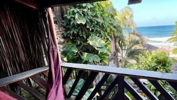 Family Room, Balcony, Sea View | Property grounds