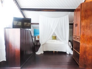 Deluxe Triple Room, Partial Sea View | Minibar, free WiFi - Beach House NATUREZA (Itacare)