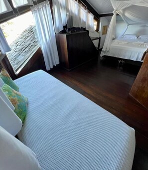 Deluxe Triple Room, Partial Sea View | Minibar, free WiFi - Beach House NATUREZA (Itacare)