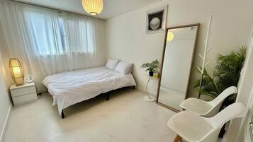 Blackout drapes, soundproofing, iron/ironing board, free WiFi