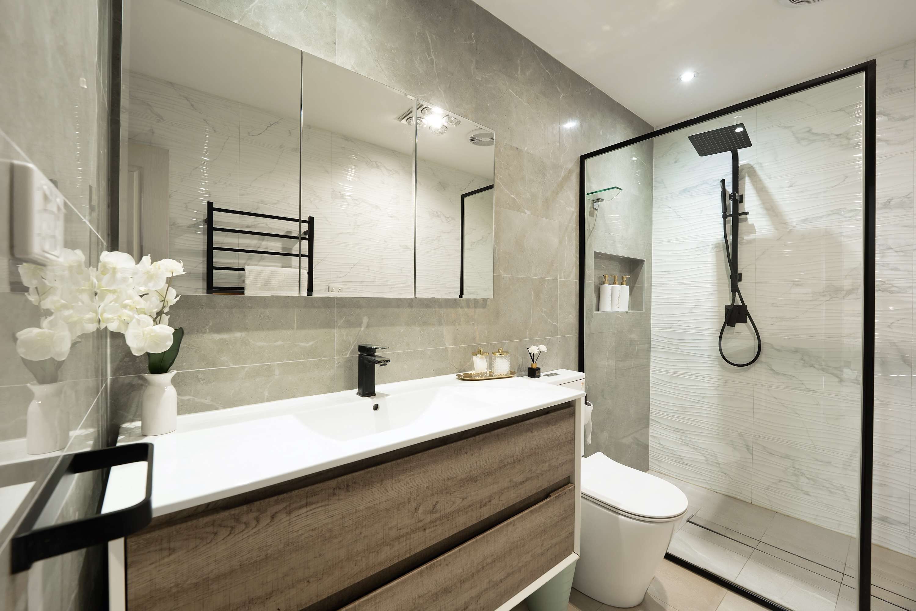 Shower, hair dryer, towels, shampoo