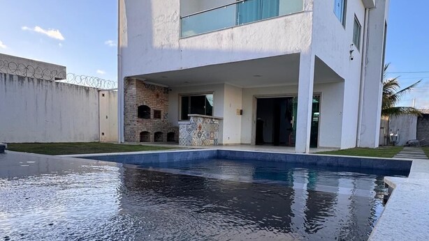 A modern two-story house with a swimming pool in front. - Casa Sol e Sal is the beach house with a pool for your family. (Prado)