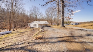 A rural property with a house, a gravel driveway, and a wooded area. - 4 Mi to Gauley River Rapids! Outdoor Adventure Hub (Summersville)