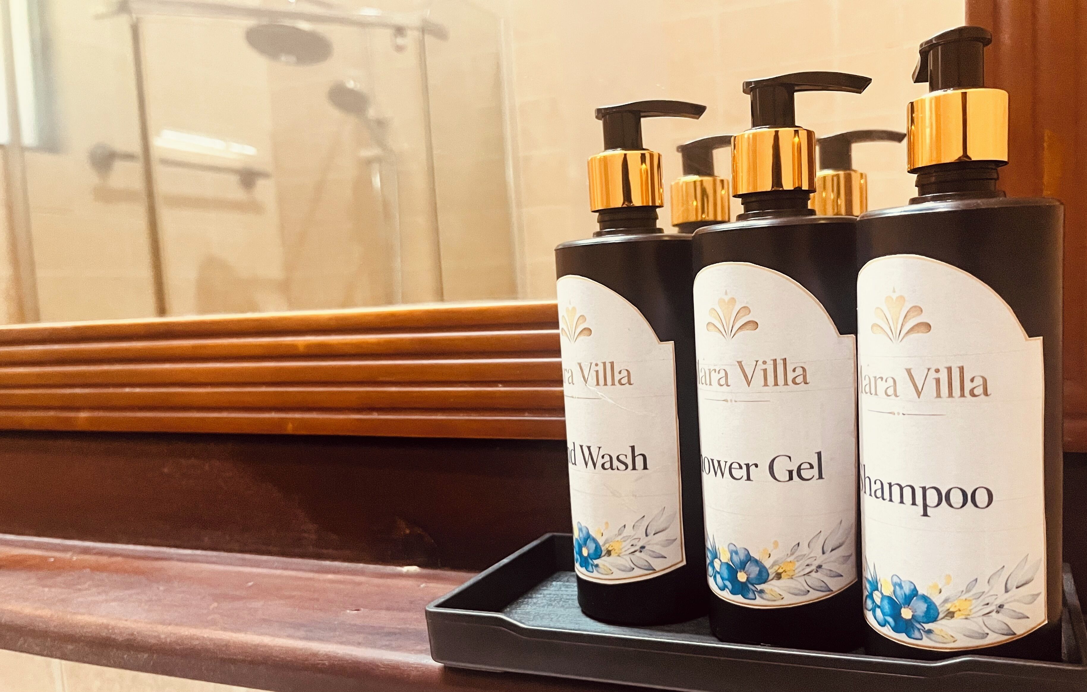 Separate bathtub and shower, towels, soap, shampoo