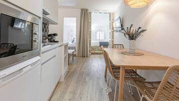 Apartament Deluxe, vistes a la ciutat | Servei de restauració