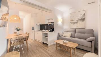 Deluxe-Apartment, Stadtblick | Wohnbereich