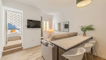 Deluxe Apartment, Courtyard View | Laptop workspace, iron/ironing board, free WiFi