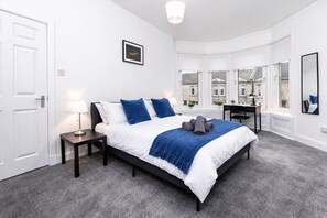 2 dormitorios, tabla de planchar con plancha, wifi gratis y ropa de cama