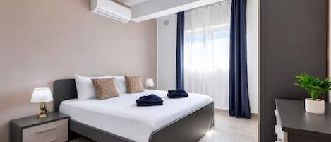 2 chambres, fer et planche Ă repasser, Wi-Fi gratuit, draps fournis
