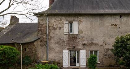 Appartement « Dans Manoir du XVII e » avec jardin privé et Wi-Fi