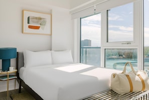 Premium bedding, memory-foam beds, laptop workspace, blackout curtains - Nester Finn West Queen West (Toronto)