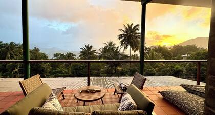 Architect-designed villa with colonial-style veranda. Spa, volcano & sea views .