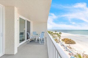 Outdoor dining - Sand Castle II 2603🏖️Beachfront🌴Private Balcony🐬Direct Beach Access (Indian Shores)