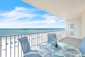 Outdoor dining - Sand Castle II 2603🏖️Beachfront🌴Private Balcony🐬Direct Beach Access (Indian Shores)