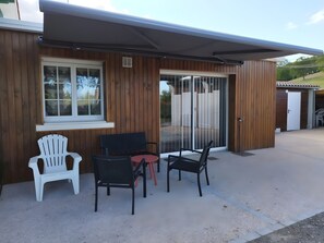 Terrace/patio - Gite at Françoise and Noël’s with Mountain View, Wi-Fi, and Air Conditioning (Sauveterre-de-Béarn)