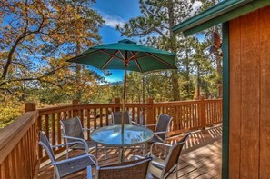Outdoor dining - Spacious Moonridge Log Cabin with A/C, Game Room, 2 Fireplaces & Fenced Yard (Big Bear City)