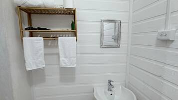Hair dryer, towels, soap, toilet paper