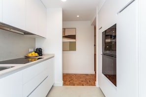 Private kitchen - A light-filled three-bedroom on the edge of Cuatro Caminos and Tetuán, with open views, a private terrace and a sleek new kitchen and bathroom, a short walk from the Castellana and many shopping streets. (MADRID)