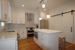 Private kitchen - The Coastal Collective • Rooftop Deck & Poolside Living on 30A (Santa Rosa Beach)