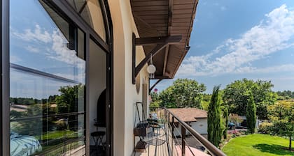 Gästezimmer „Doppelzimmer Papageien“ – Salzwasserpool – Terrasse – gemeinsamer Garten