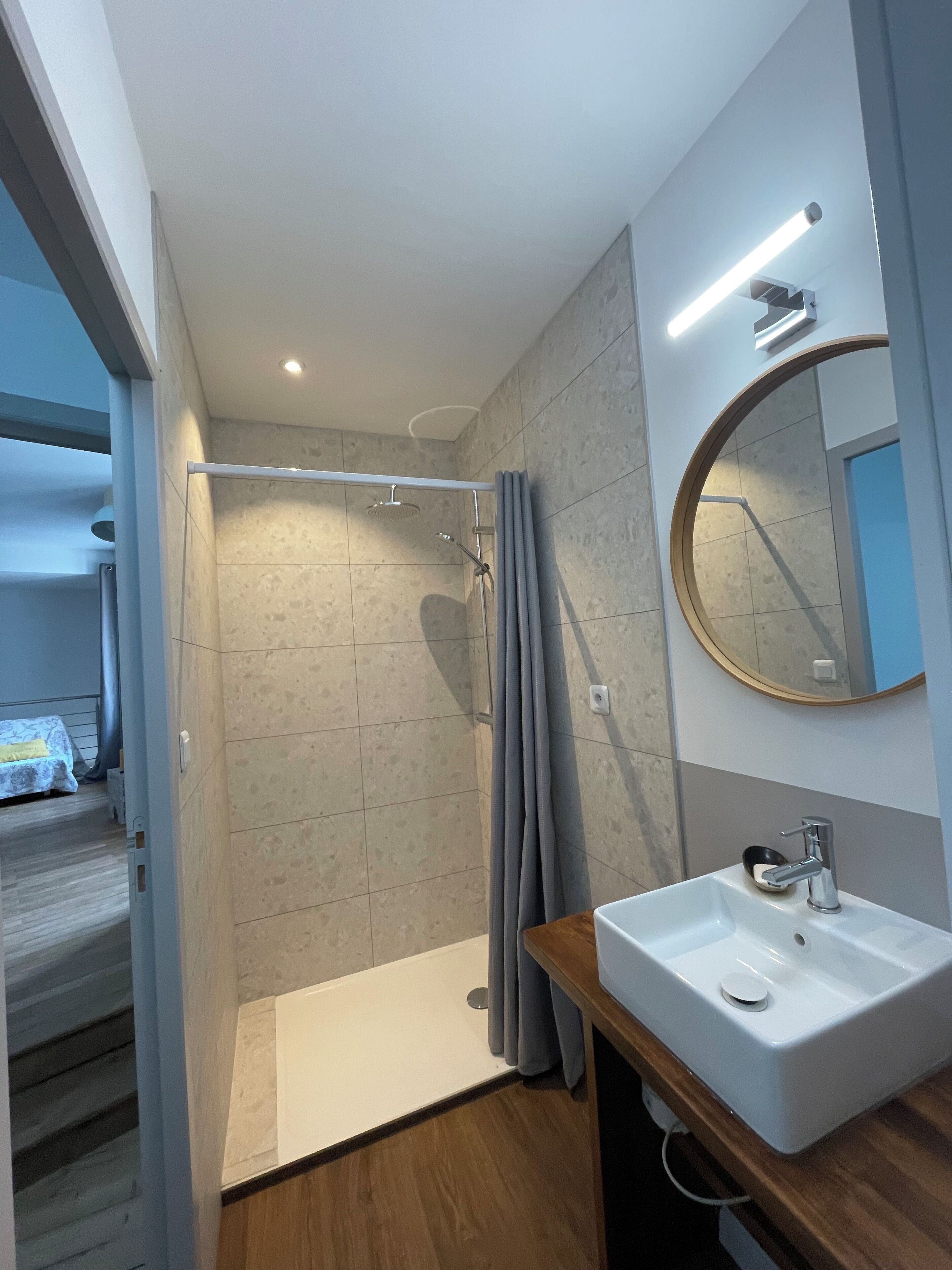 Shower, hair dryer, towels, toilet paper