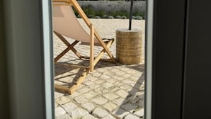 Dobbeltrom – deluxe, 1 dobbeltseng, hageutsikt | Innvendig