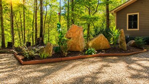 A house surrounded by a forest with a gravel path and large rocks in the garden. - 6/5 Valley View! Close to Helen! Near Hiking & Wineries (Clarkesville)