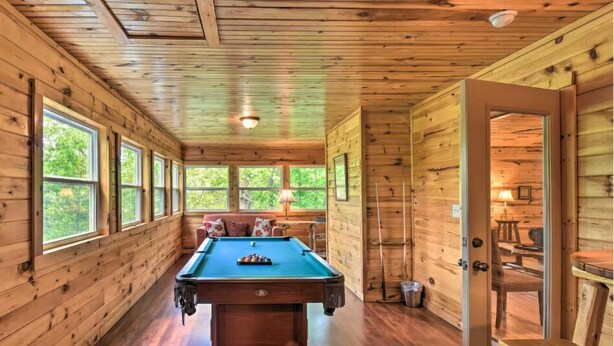 A wooden interior with a pool table, large windows, and a door leading to another room. - 6/5 Valley View! Close to Helen! Near Hiking & Wineries (Clarkesville)